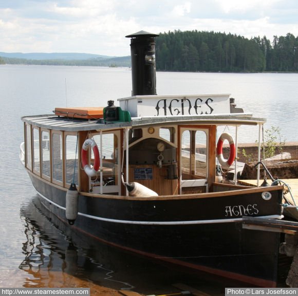 Steamboat Agnes moored at a landing-stage